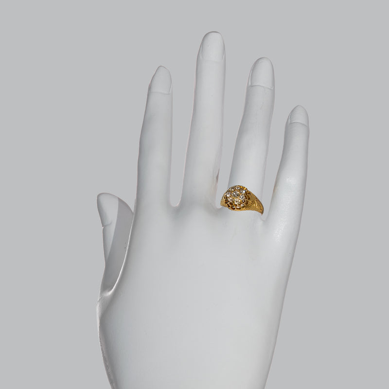 Victorian Old Mine Cut diamond cluster ring shown on the finger demonstrating its remarkable finger presence and elegant proportions.