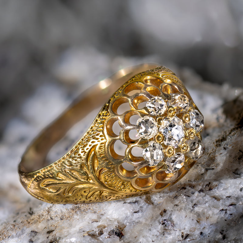 Authentic Victorian Old Mine Cut diamond cluster ring in solid 18K yellow gold featuring eight natural hand-cut diamonds with crisp hand engraving and exceptional finger presence.