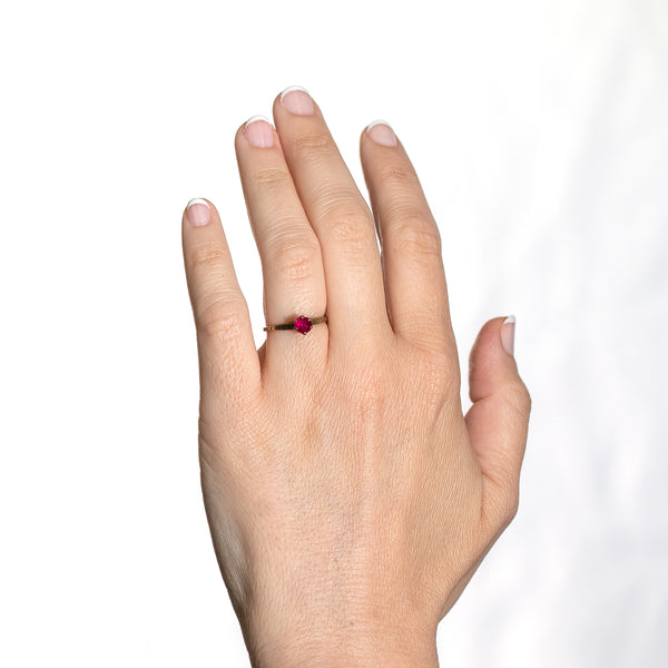 Antique Victorian ruby ring worn on hand showing scale, color, and vintage character