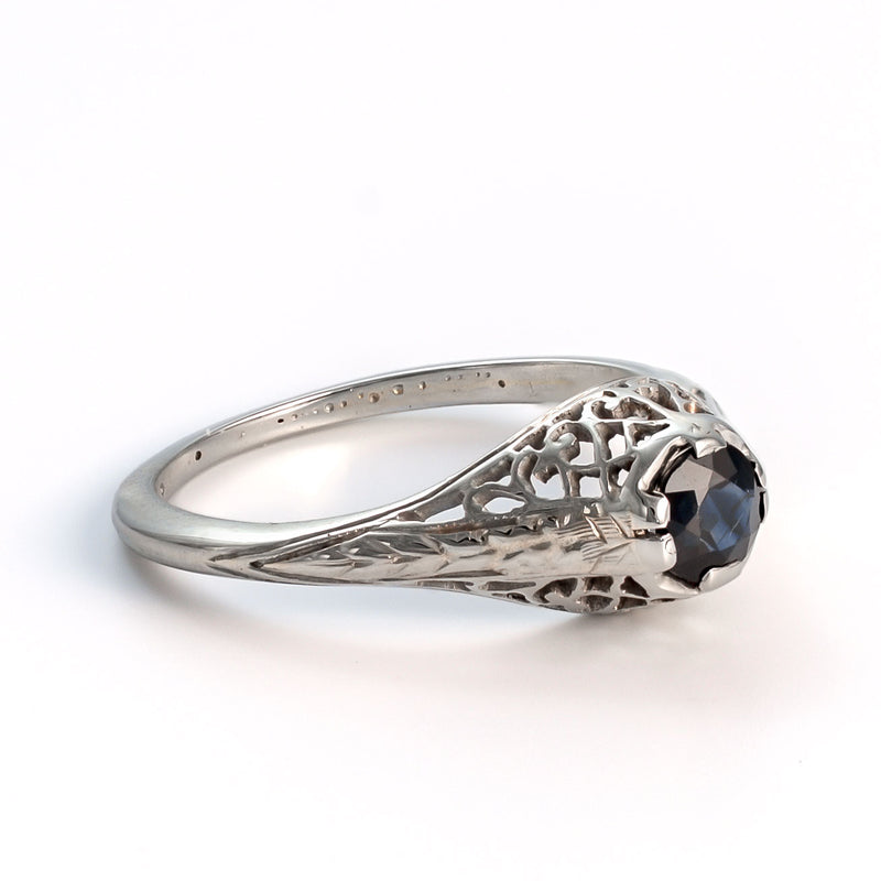 Left profile view highlighting the crisp chevron engravings and architectural filigree gallery.