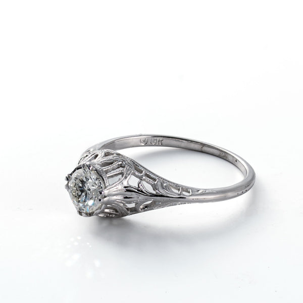 Right side profile of an Old European Cut diamond ring with pierced Art Deco detailing