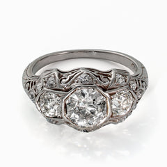 1920s Art Deco Platinum Three-Stone Ring with Old European Cut Diamond Open Culets
