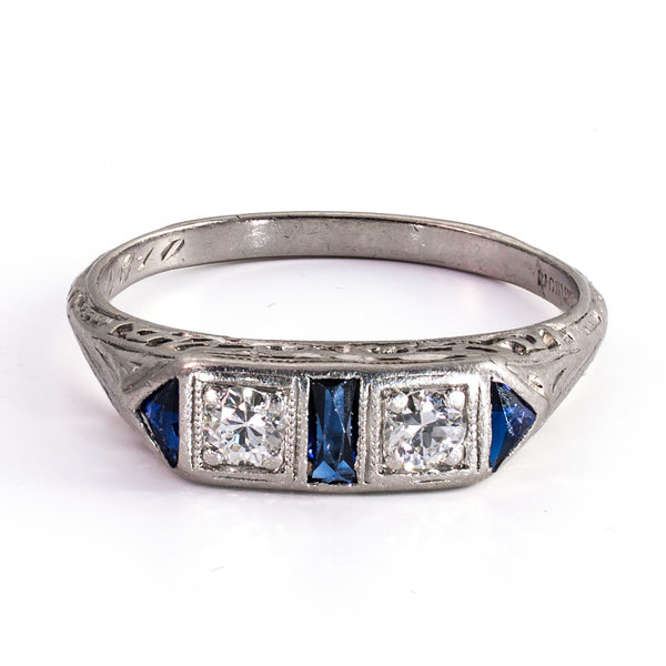 Front elevated view of a 5 stone ring. Crafted in platinum and featuring 2 diamonds and 3 sapphires.
