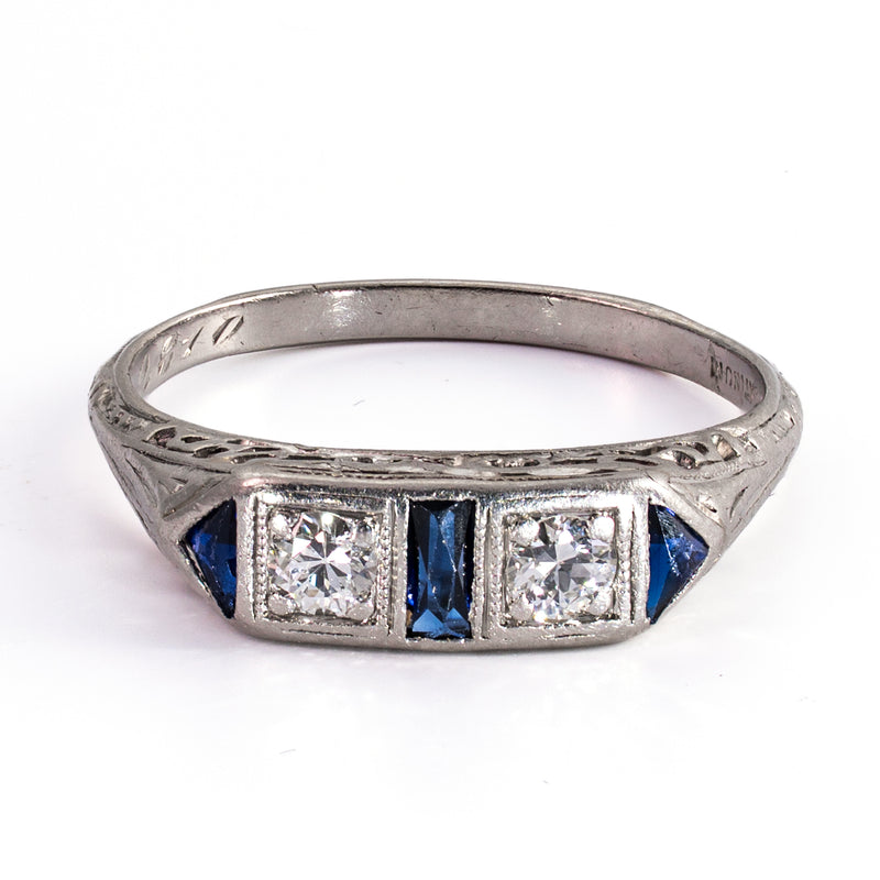 Front elevated view of a 5 stone ring. Crafted in platinum and featuring 2 diamonds and 3 sapphires.