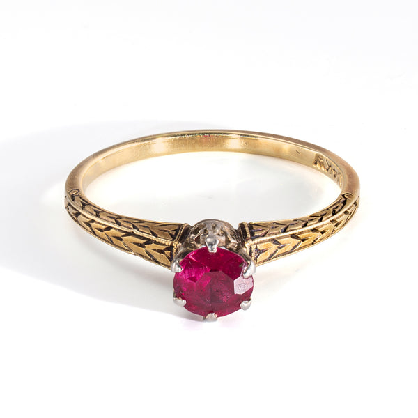antiques hand engrave ring in white and yellow gold with a natural ruby