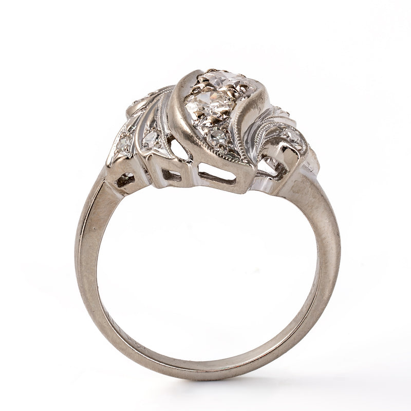 profile-view-1940s-retro-diamond-bypass-ring-height-off-finger-pierced-gallery