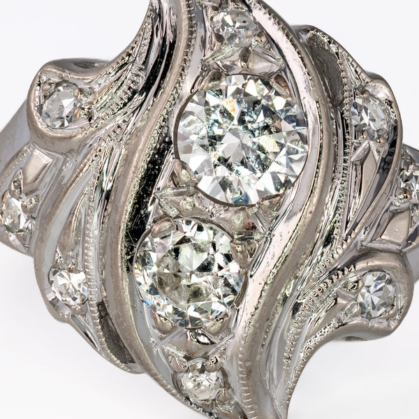macro-view-two-transitional-cut-diamonds-vintage-bypass-setting