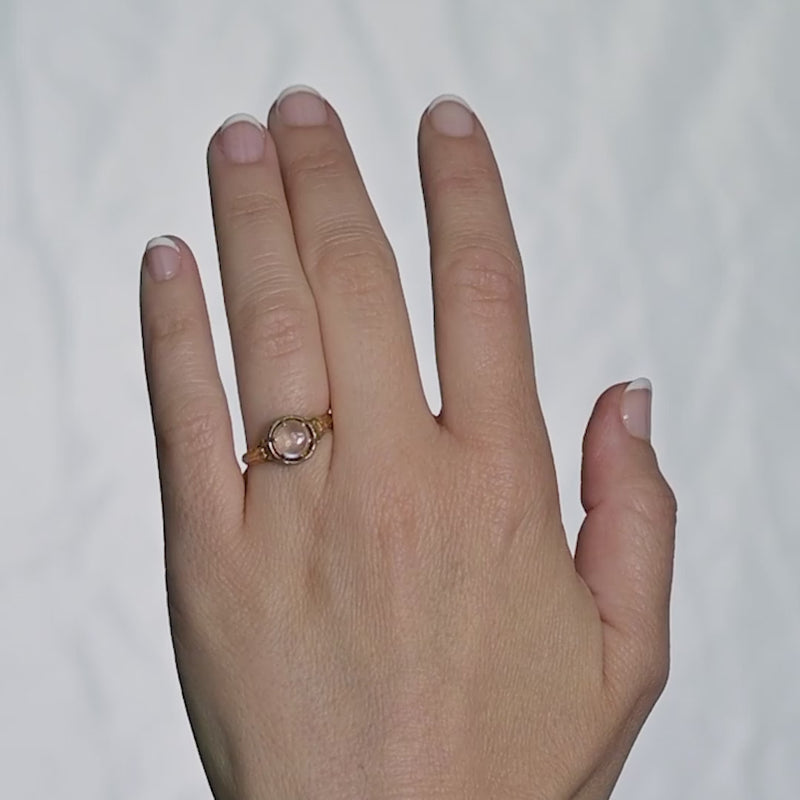 video of handmotion with an antique moonstone ring.