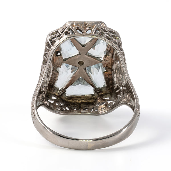 Underside view of the 18K white gold Art Deco ring showing the undergallery framework and fitted gemstones.