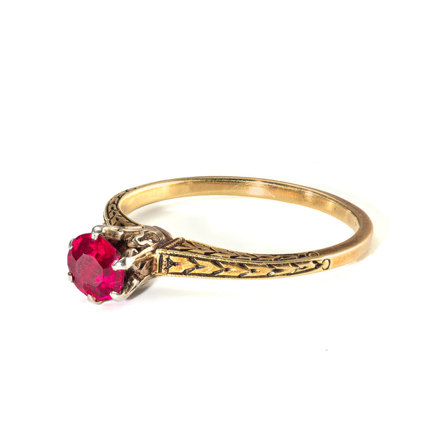 century old craftsmanship in a circa 1910 to 1920 ruby and two tone gold ring.