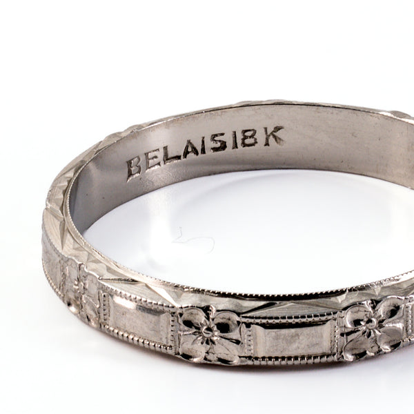 Close-up of authentic stamped BELAIS 18K hallmark on inner shank of antique white gold ring.