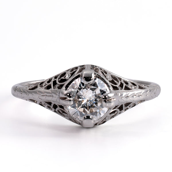 Direct overhead view of an early 1920s Art Deco transitional-cut diamond solitaire filigree ring